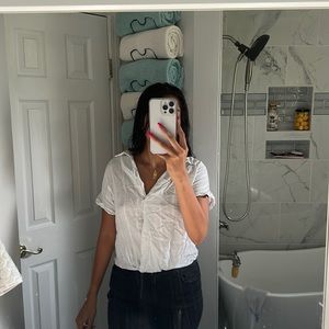 Size small. Just needs to be ironed. Worn once